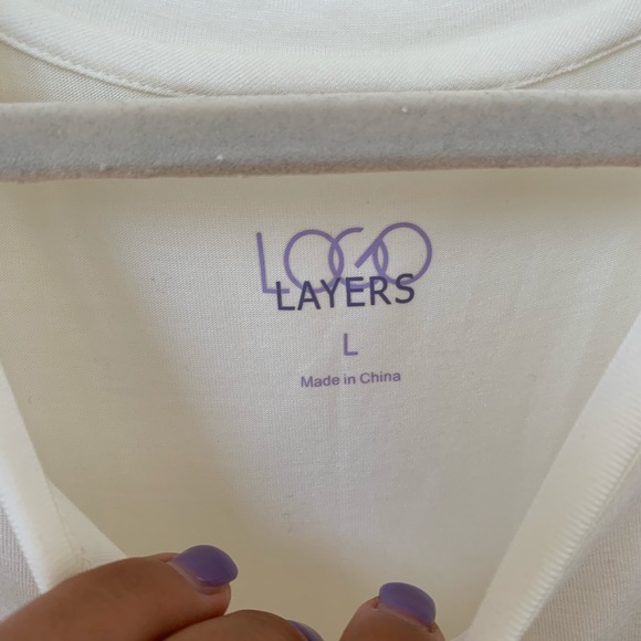 Logo Layers Soft White Asymmetrical Tank Top - Picture 5 of 6